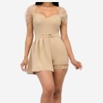 A stylish women's asymmetrical pleated skort belted romper, perfect for a fashionable and comfortable look.